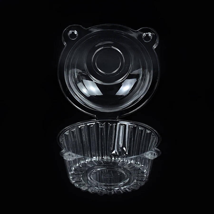 Clear cupcake boxes with decorative lids and ruffled bottoms for parties and events