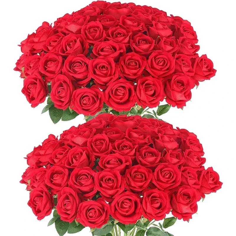 A dense bouquet of vibrant red artificial silk roses.