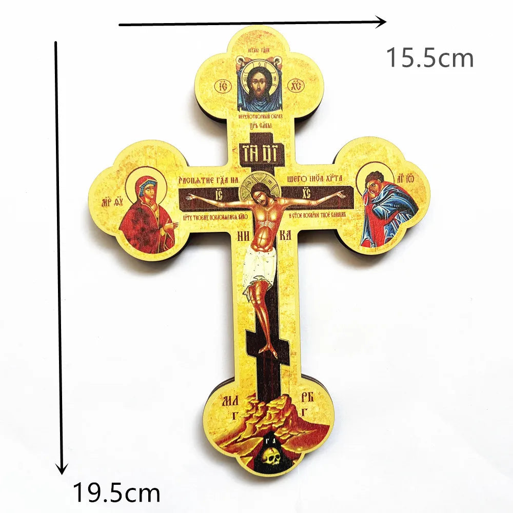 A handcrafted wooden Orthodox cross wall decor with various icons and inscriptions.