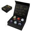 A gift box containing natural stone zodiac bracelets for Aries, including various crystals and stones.