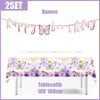 A banner and tablecloth featuring a butterfly theme for a party set