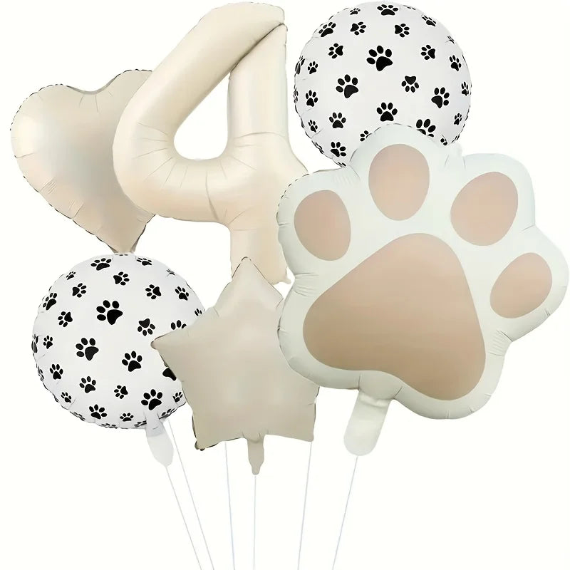 A set of six foil balloons featuring paw prints and the number four in beige and white.