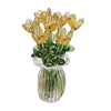 Hand-blown glass flower bouquet with yellow tulips in a green glass vase