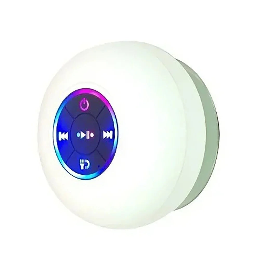 A white waterproof Bluetooth speaker with a suction cup feature.