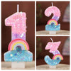 Rainbow sequined number candles shaped like the number one and two for birthday cakes