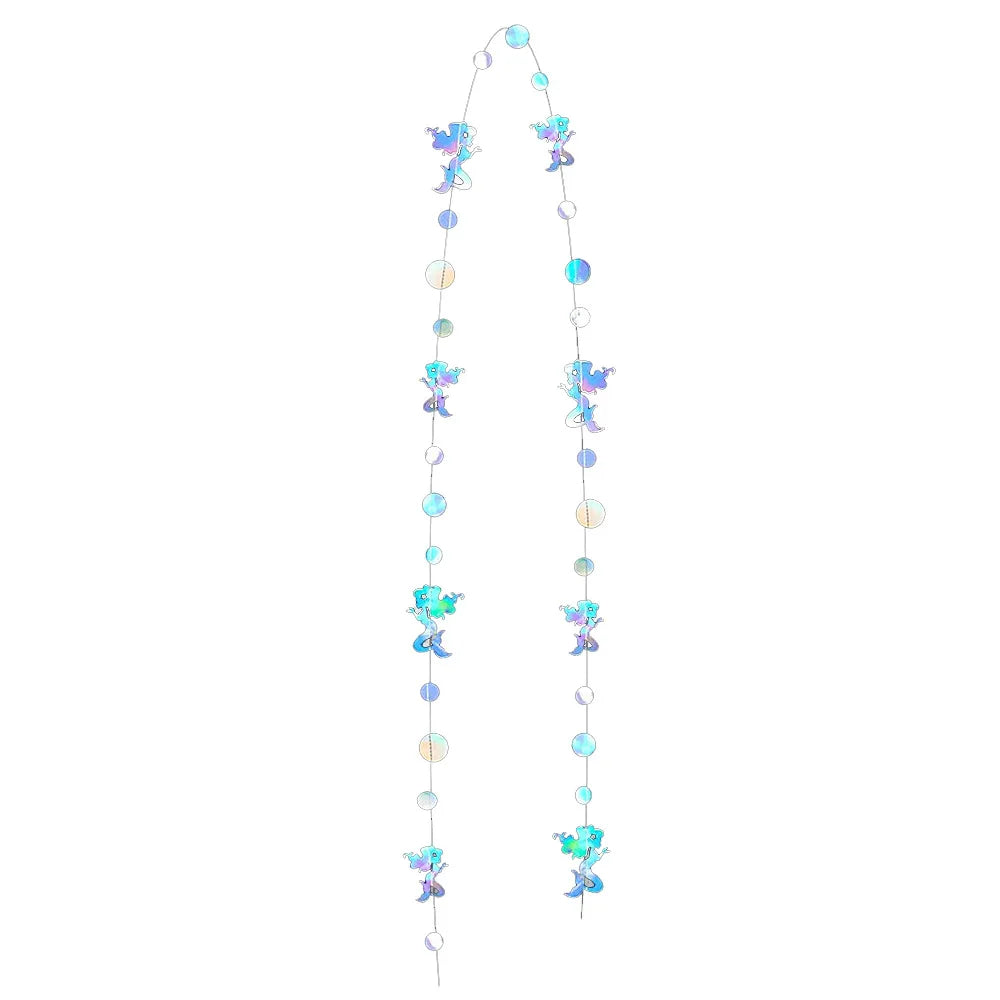 Iridescent mermaid and jellyfish party streamers in various shades of blue and teal