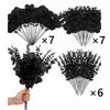 A collection of black artificial eucalyptus leaf stems packaged in multiple bundles for decor