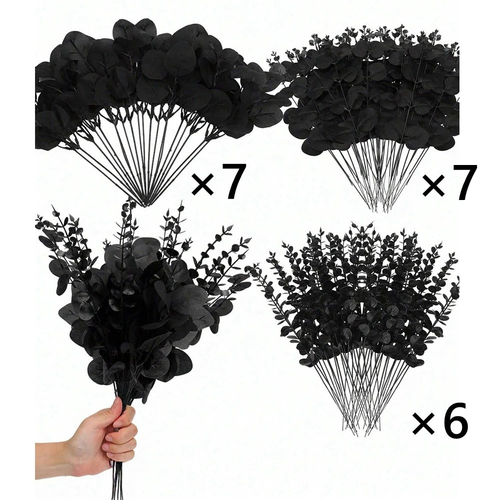 A collection of black artificial eucalyptus leaf stems packaged in multiple bundles for decor
