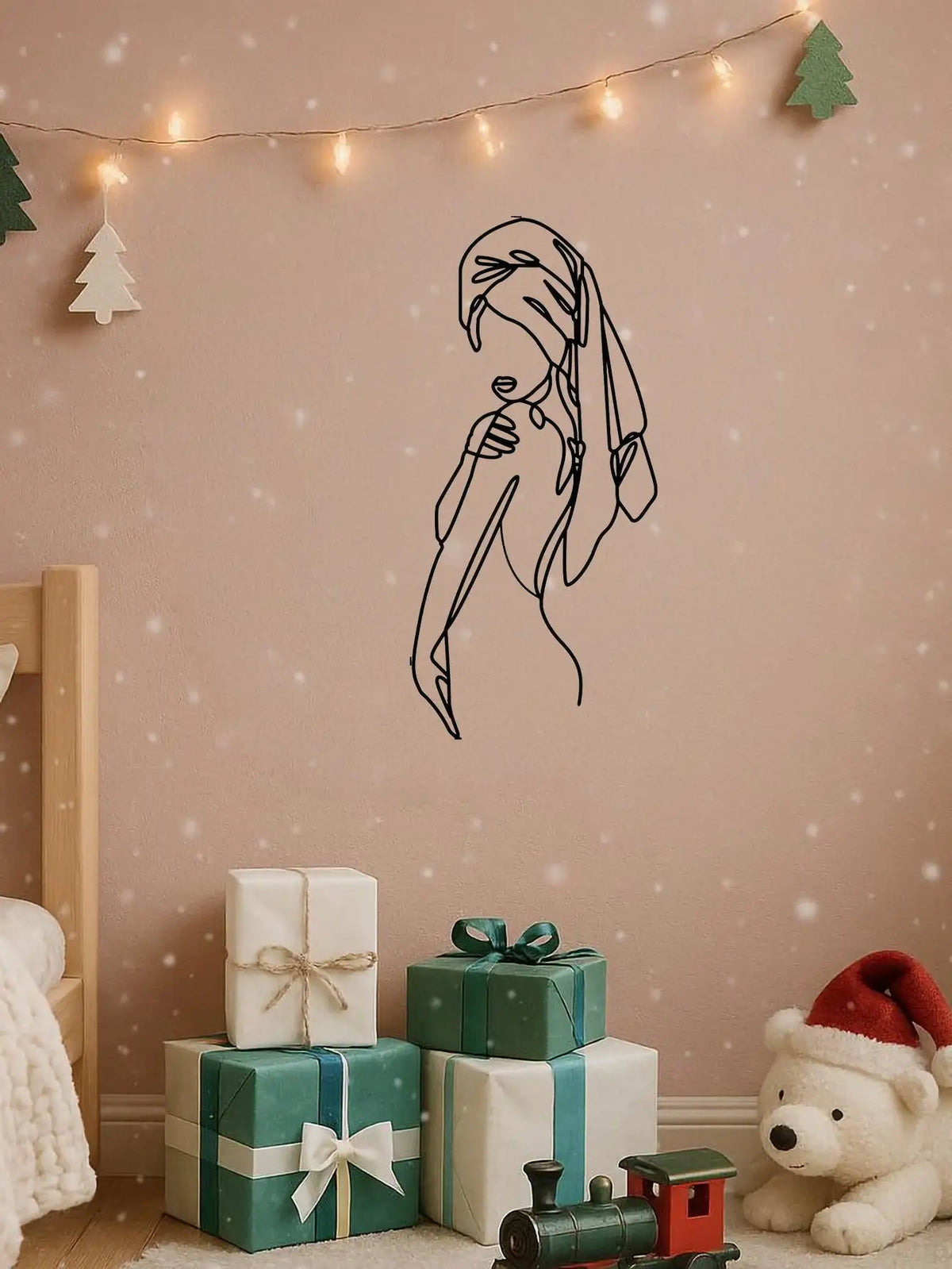 A black line art silhouette of a girl's profile on a wall, decorated with string lights and Christmas trees.
