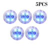 Five luminous blue LED coaster lights designed for bottles and glasses