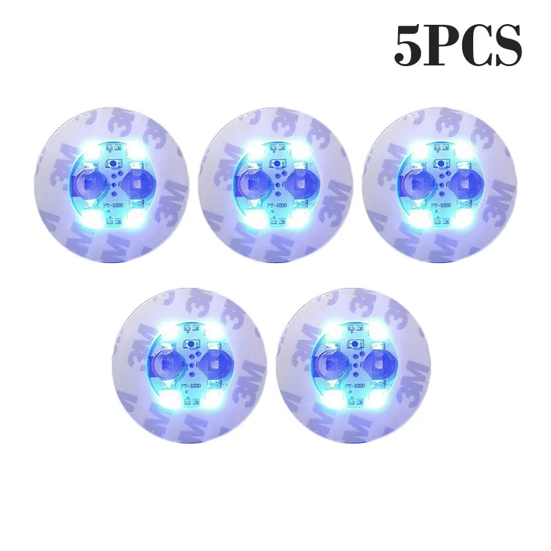 Five luminous blue LED coaster lights designed for bottles and glasses