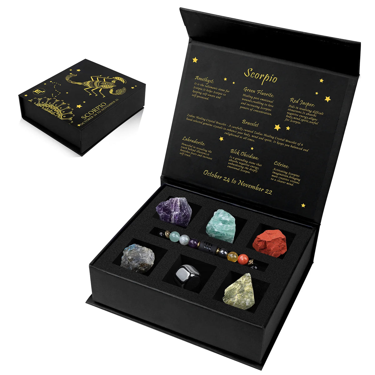 A black gift box containing a natural stone zodiac bracelet and various crystals for Scorpio.
