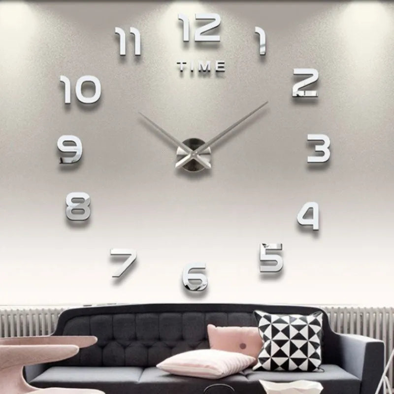 A modern 3D acrylic wall clock with DIY sticker numbers displaying the time.