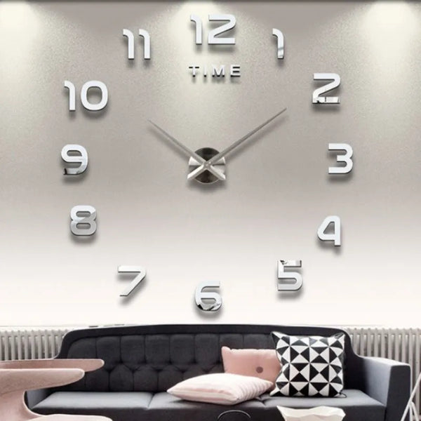 A modern 3D acrylic wall clock with DIY sticker numbers displaying the time.