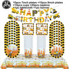 A set of construction vehicle themed birthday party tableware including plates, cups, napkins, tablecloth, and banner