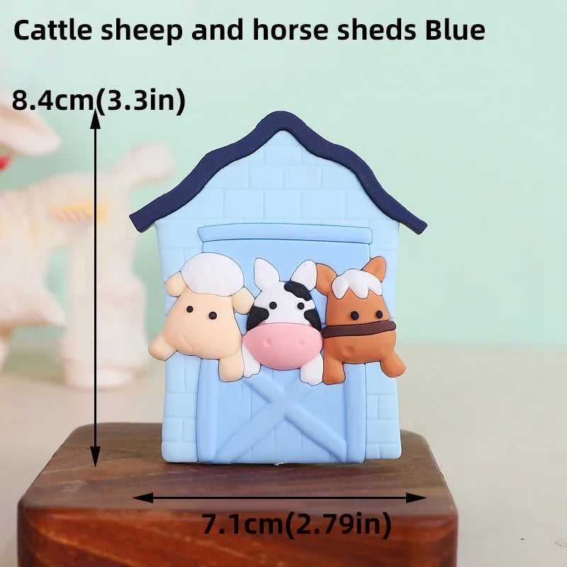 Blue wooden shed figurine featuring a cattle sheep and horse, measuring 8.4cm tall.