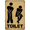 A vintage brown tin sign with a black silhouette of a person indicating a toilet.