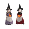 A set of two witch ornaments featuring a black pointed hat and rustic clothing with orange accents.