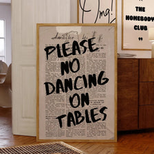 Vintage newspaper style canvas wall art featuring text about no dancing on tables