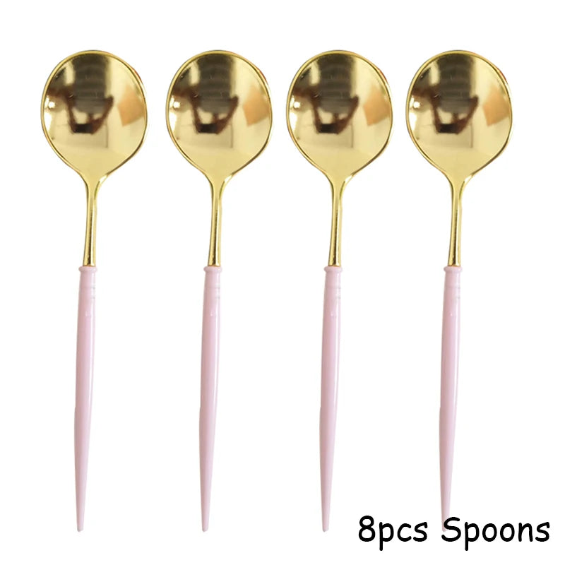 Eight gold spoons with pink handles for a party tableware set
