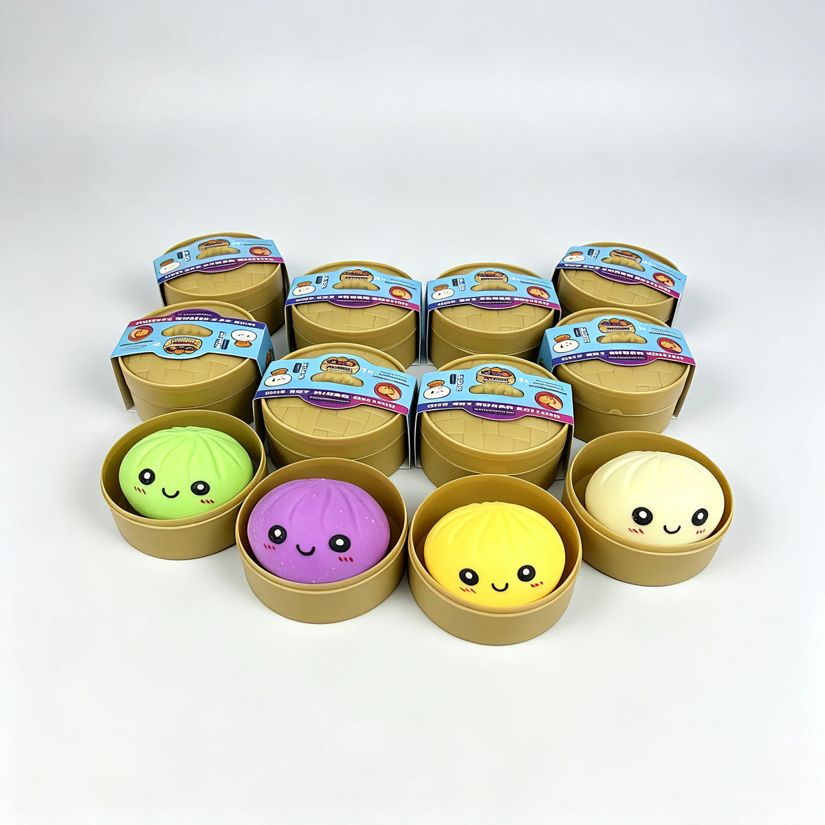 A collection of colorful simulated dumpling squishy toys in various packaging and colors.