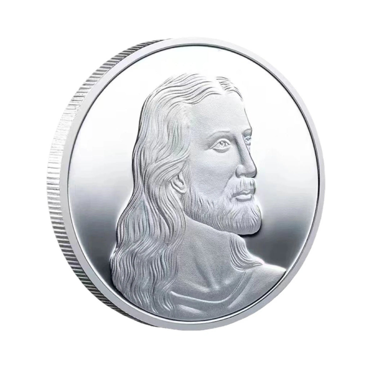 A silver commemorative metal coin featuring a profile portrait of Jesus Christ.