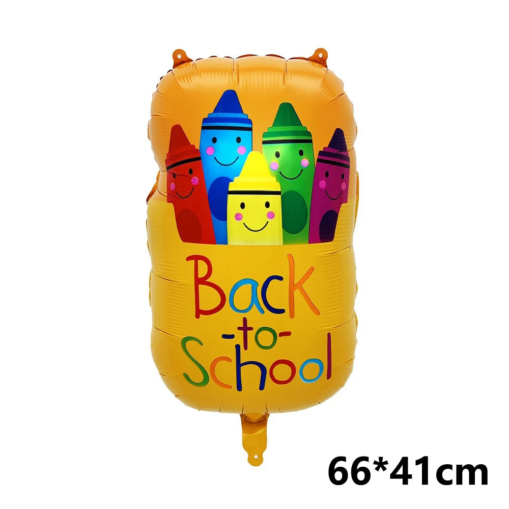 Geloner Folienballon in Form eines Schulranzens, gefüllt mit bunten Cartoon-Ballons.