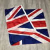 A folded United Kingdom national flag displaying the Union Jack design.