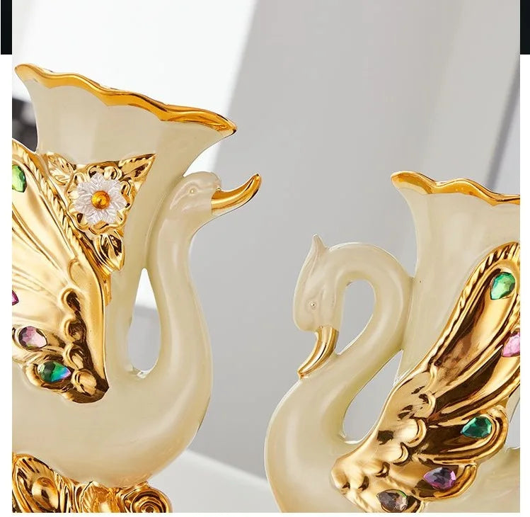Gold ceramic swan vase for tabletop decor featuring gold and white tones