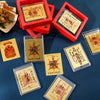 A collection of square stickers featuring Chinese characters for lucky wealth, prosperity, and good fortune on various colore