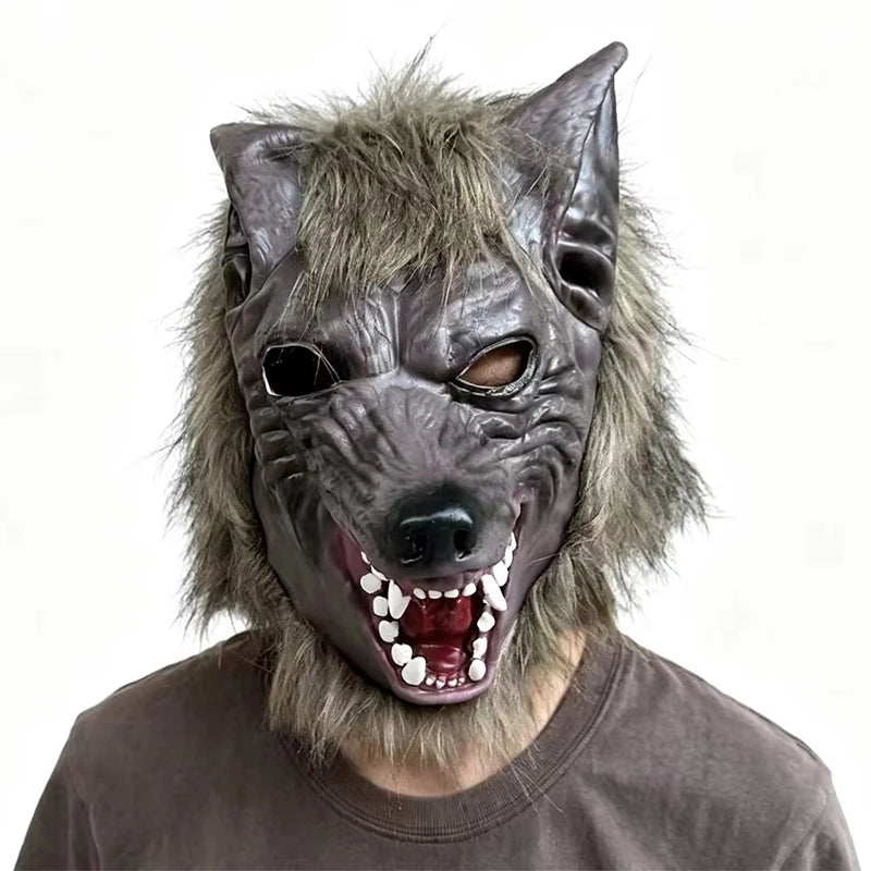 A realistic werewolf full head mask with gray fur and fierce facial features worn by a person.