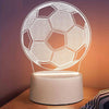 A white wireframe football light sculpture illuminates a round base.