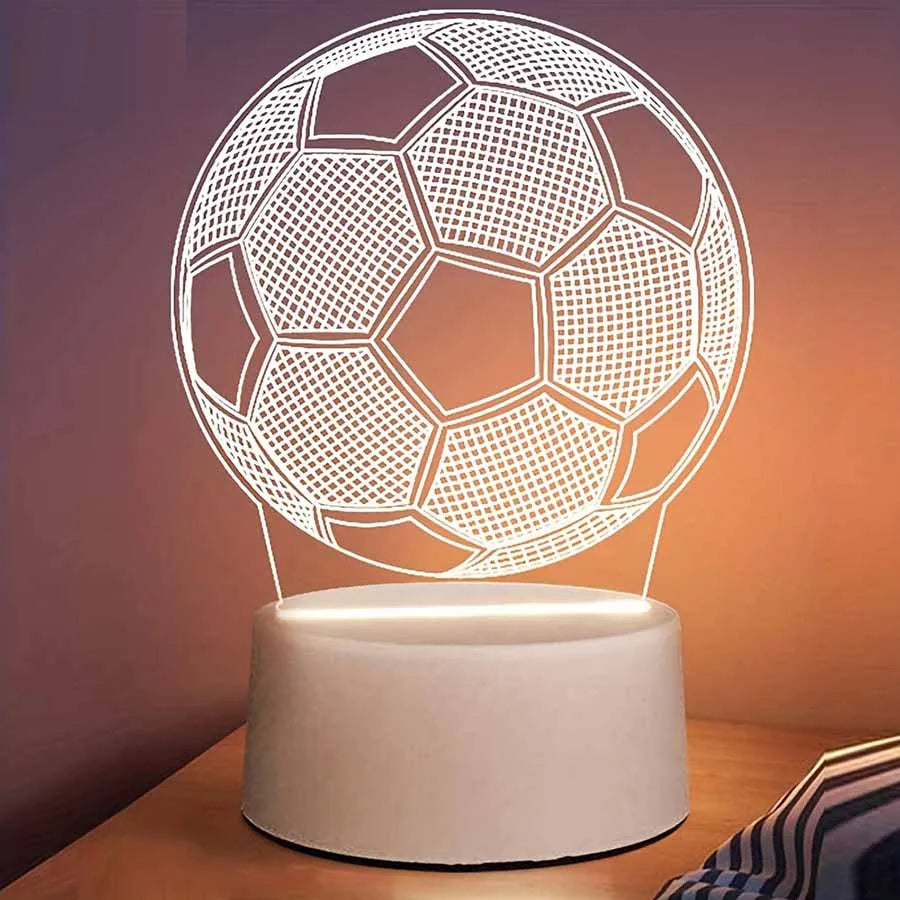 A white wireframe football light sculpture illuminates a round base.