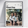 A framed poster titled The Parent Trap featuring two young girls sitting outdoors.