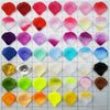 A grid displaying various shades of pink, red, purple, and green silk rose petals for weddings and events.