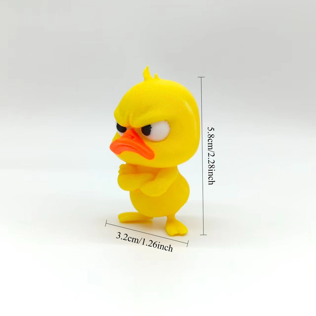 A yellow 3D printed statue of an angry duck with a prominent orange beak and furrowed brow.