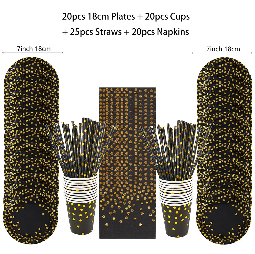 A set of black and gold disposable dinnerware including plates, cups, straws, and napkins.