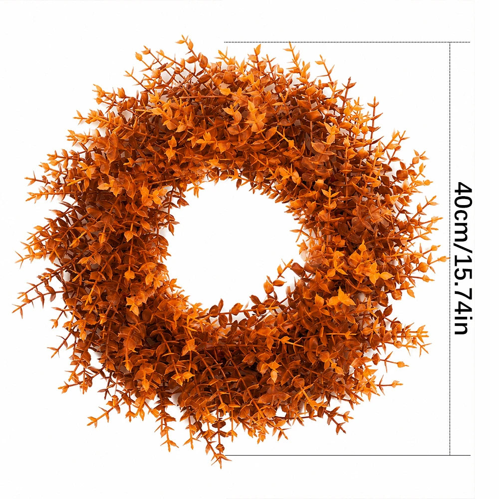 An artificial autumn colored eucalyptus wreath with a wire frame and a measurement of 40cm x 15.74in.