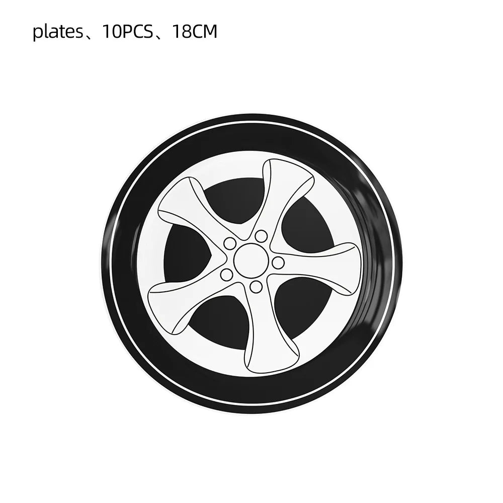 A black circular plate with a silver-colored racing car design.