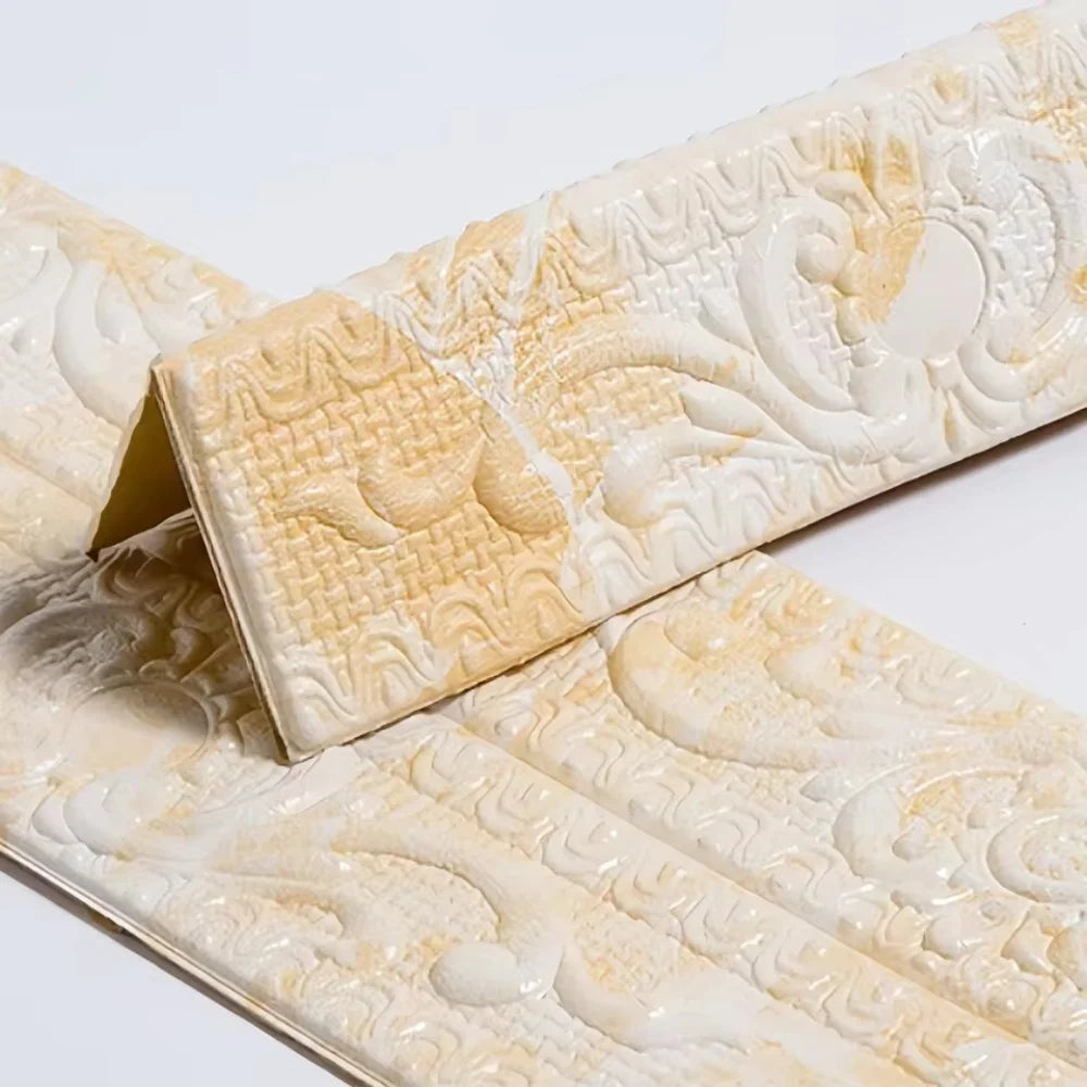 Close-up of a beige self-adhesive PVC corner trim with a 3D textured edge and swirling decorative pattern.