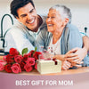 A smiling man and woman looking at a personalized acrylic block puzzle gift for mom