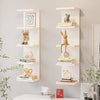 A five-tier wall-mounted storage shelf displaying various decorative items and books.