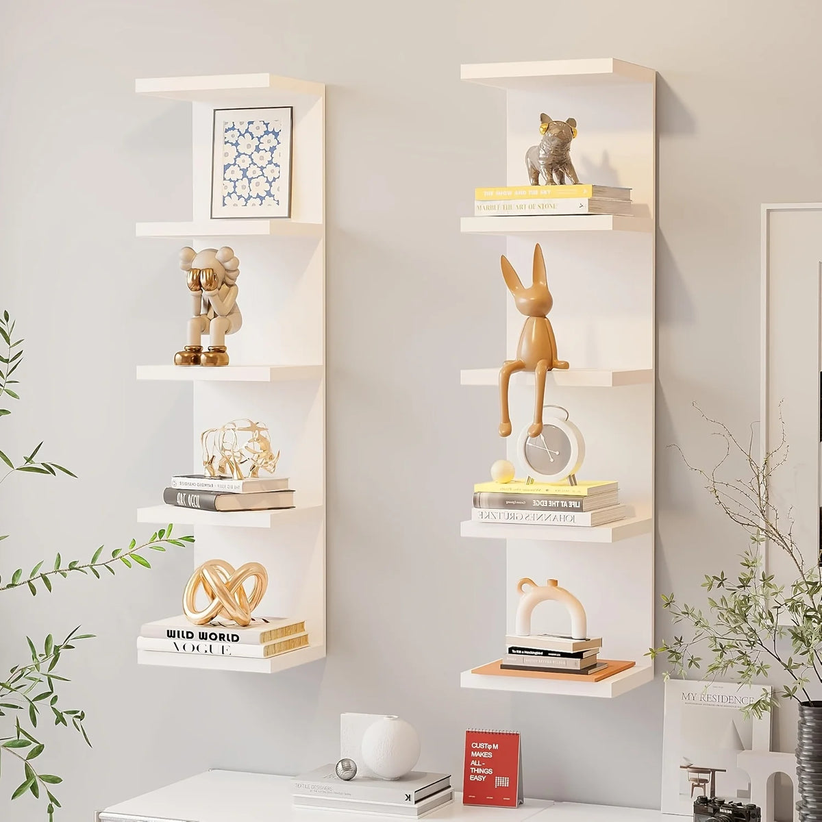 A five-tier wall-mounted storage shelf displaying various decorative items and books.
