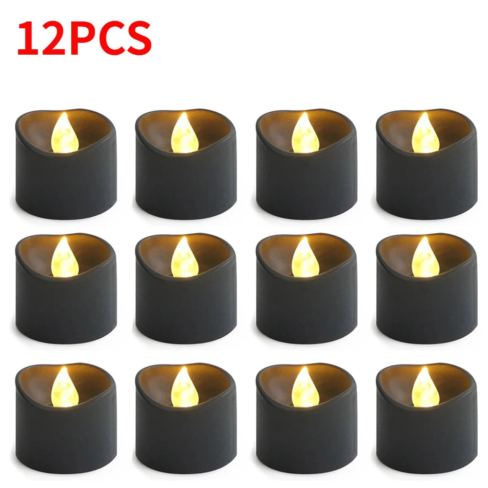 Twelve black LED candles with a warm white glow displayed in a grid format.