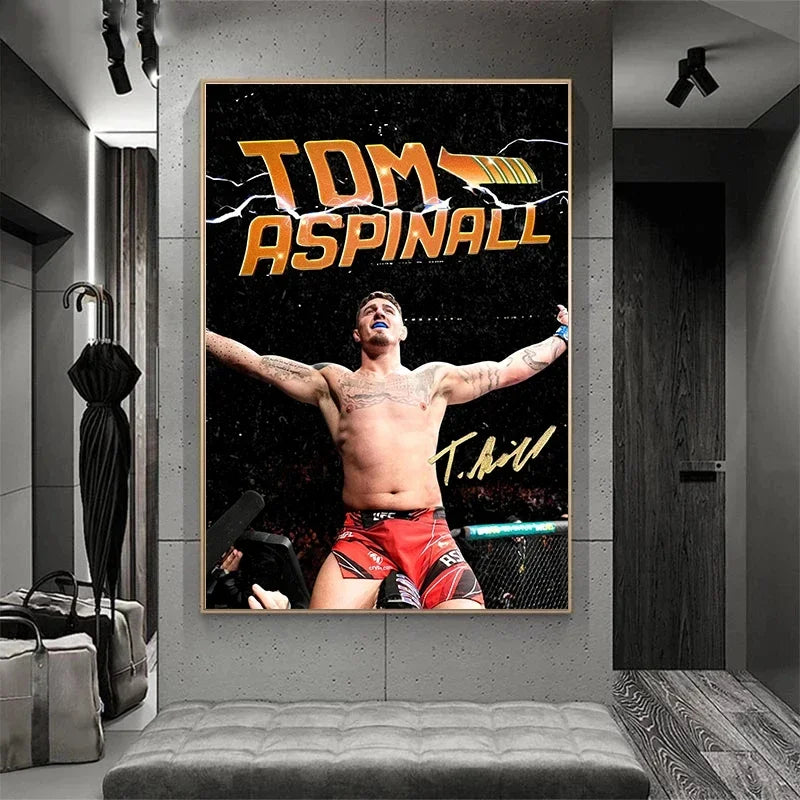 A canvas wall art featuring the name TOM ASPINALL in bold gold lettering against a dark background.