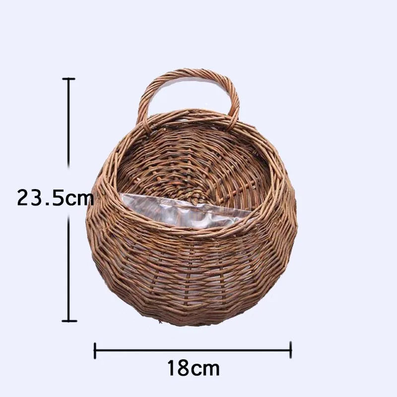 Woven brown basket with a clear plastic bag inside, shown with dimensions 23.5cm high and 18cm wide.