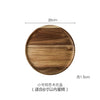 A round wooden cake tray with a glass dome cover, measuring 20cm in diameter and 1.5cm high.