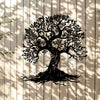 Silhouette of a large tree with roots against a wooden background.
