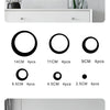 A set of geometric hollow circle mirror wall stickers in silver, red, and gold colors displayed on a wooden surface.
