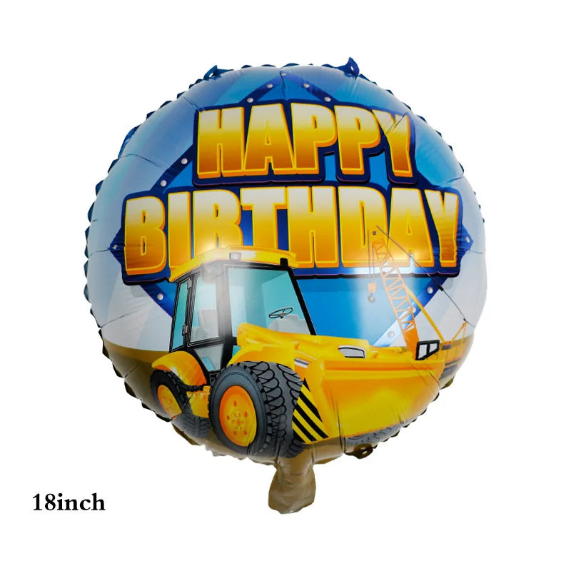 A foil balloon shaped like a construction truck celebrating a happy birthday
